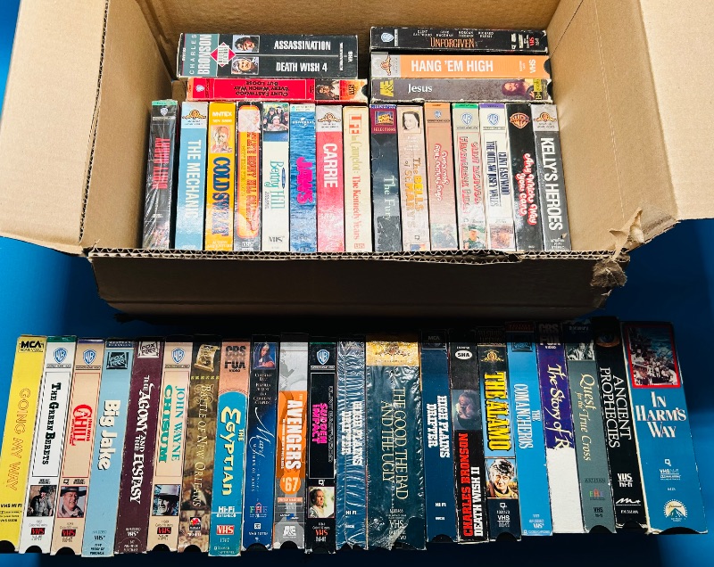 Photo 1 of 687121… final sale no returns/refunds- 40 VHS movie tapes -cases show wear from age