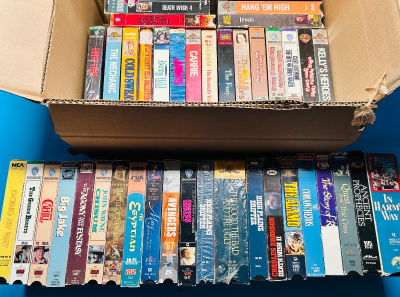 Photo 2 of 687121… final sale no returns/refunds- 40 VHS movie tapes -cases show wear from age