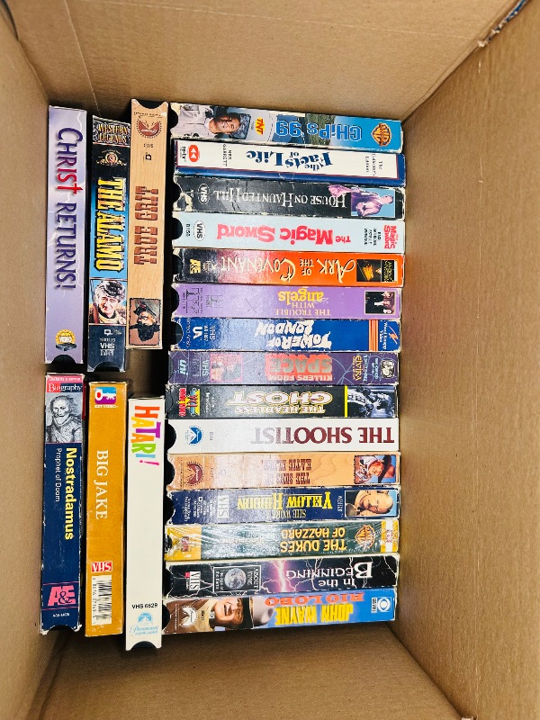 Photo 2 of 687122… final sale no returns/refunds- 40 VHS movie tapes -cases show wear from age