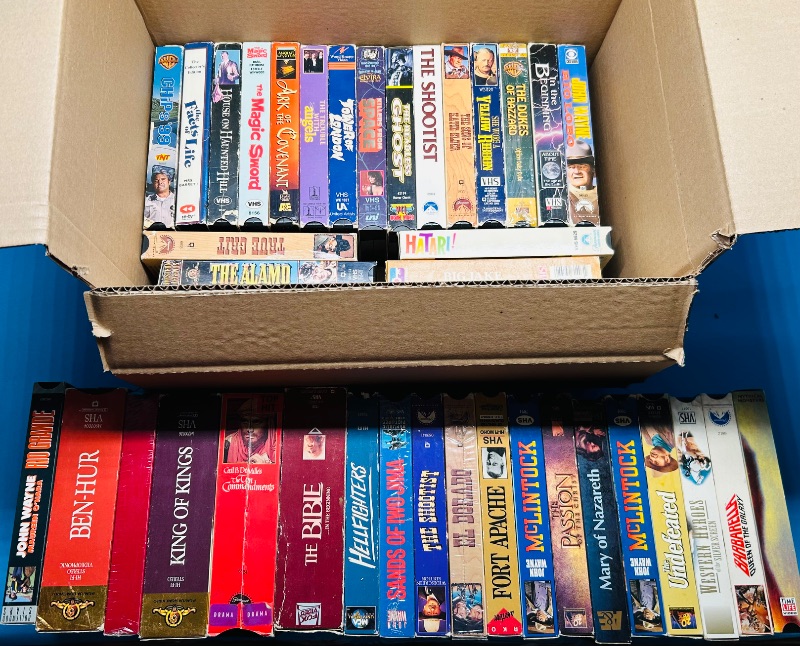 Photo 1 of 687122… final sale no returns/refunds- 40 VHS movie tapes -cases show wear from age