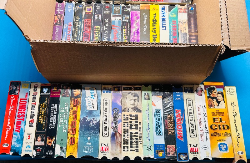 Photo 2 of 687123… final sale no returns/refunds- 40 VHS movie tapes -cases show wear from age