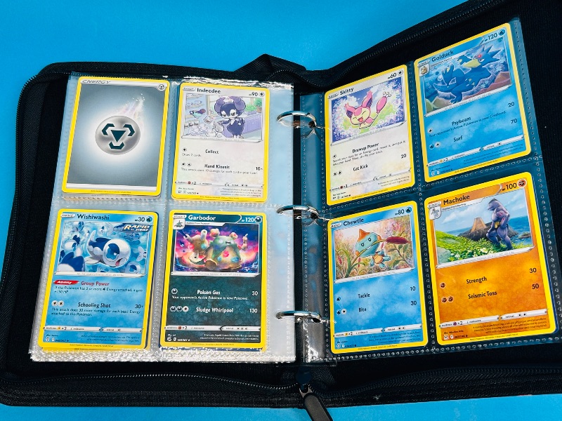 Photo 7 of 687139… final sale no returns/refunds 136 mixed Pokémon cards in binder 