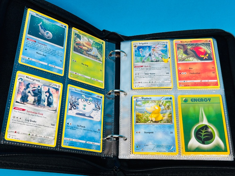 Photo 1 of 687139… final sale no returns/refunds 136 mixed Pokémon cards in binder 