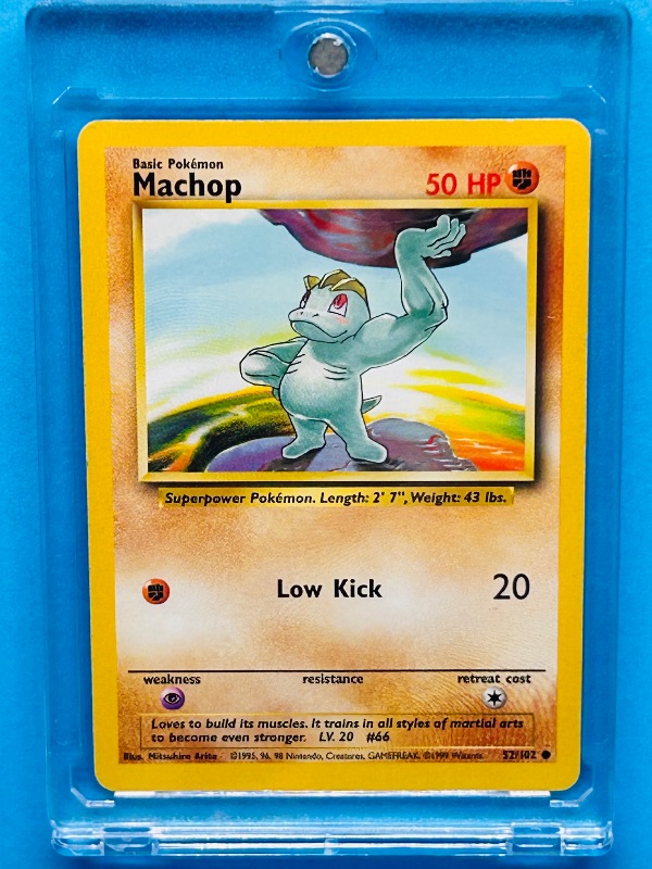 Photo 1 of 687158… Pokémon card Machop in hard plastic case 52/102