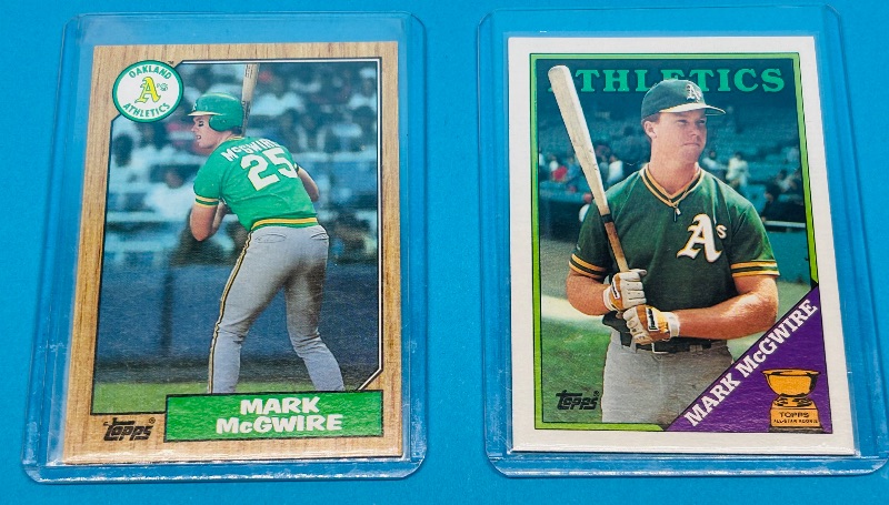 Photo 1 of 687186…2 Rookie Mark McGwire cards in hard plastic sleeves 