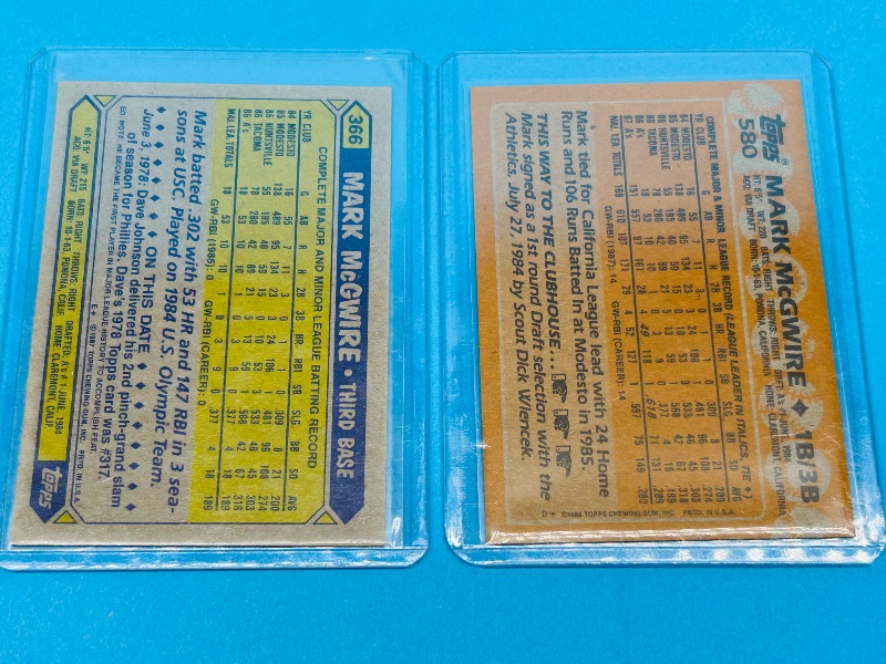 Photo 2 of 687186…2 Rookie Mark McGwire cards in hard plastic sleeves 