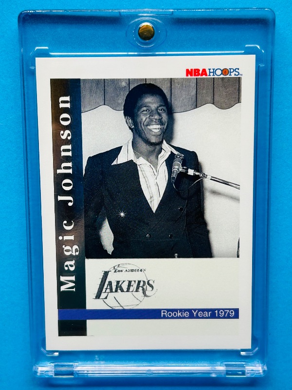 Photo 1 of 687256…Magic Johnson commemorative rookie year card in hard plastic case 