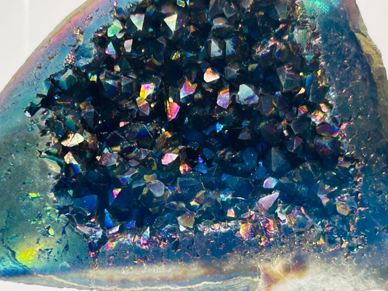 Photo 1 of 687346…3” electroplated rainbow titanium rock in acrylic display 