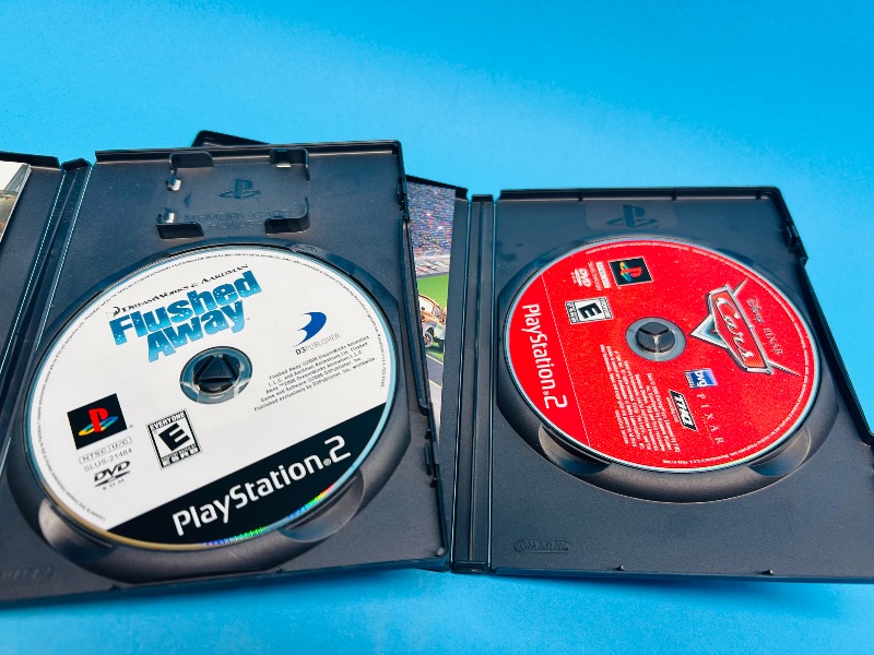 Photo 1 of 687361… 2 PlayStation 2 game discs 