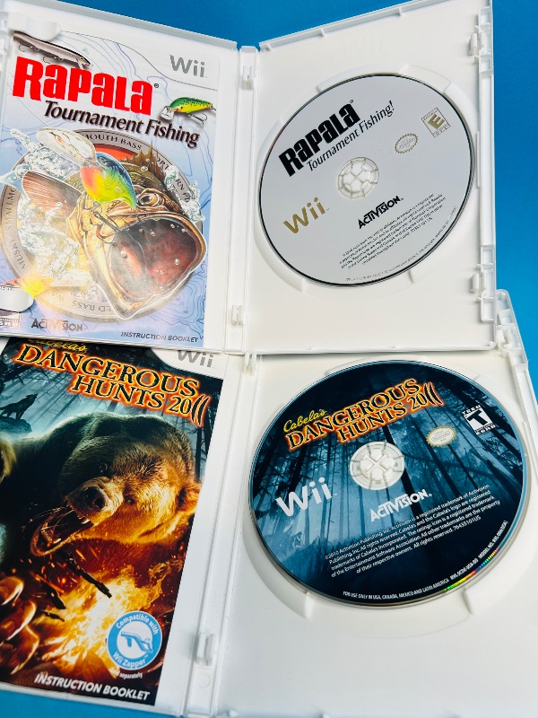 Photo 1 of 687364… 2 Wii game discs