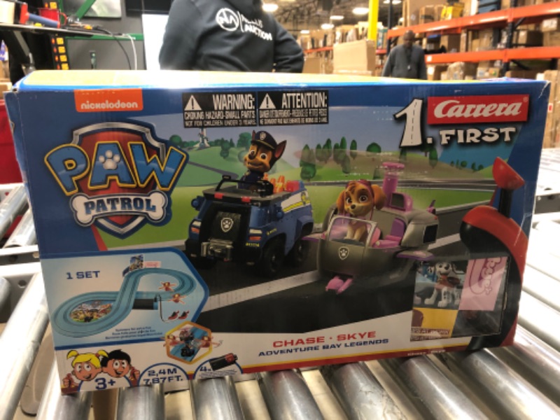 Photo 3 of Carrera First Paw Patrol - Slot Car Race Track - Includes 2 Cars: Chase and Skye - Battery-Powered Beginner Racing Set for Kids Ages 3 Years and Up, Paw Patrol - Adventure Bay