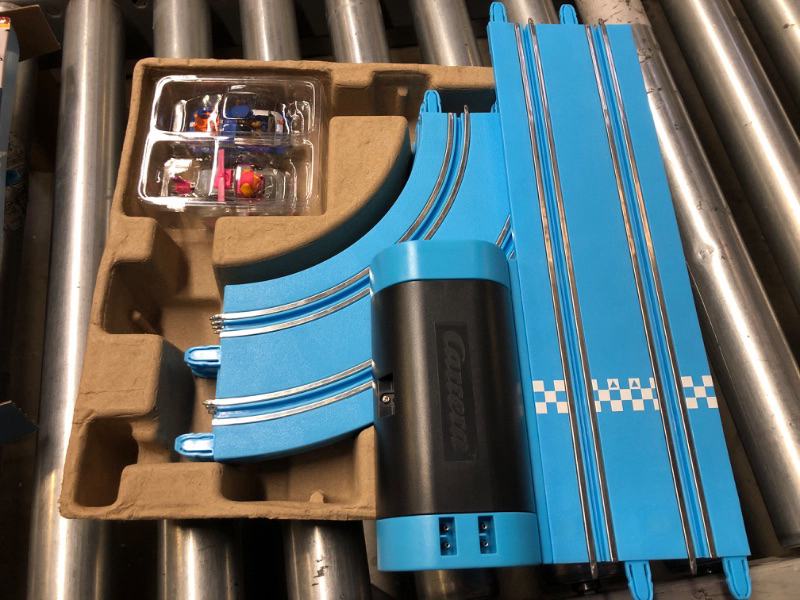 Photo 2 of Carrera First Paw Patrol - Slot Car Race Track - Includes 2 Cars: Chase and Skye - Battery-Powered Beginner Racing Set for Kids Ages 3 Years and Up, Paw Patrol - Adventure Bay