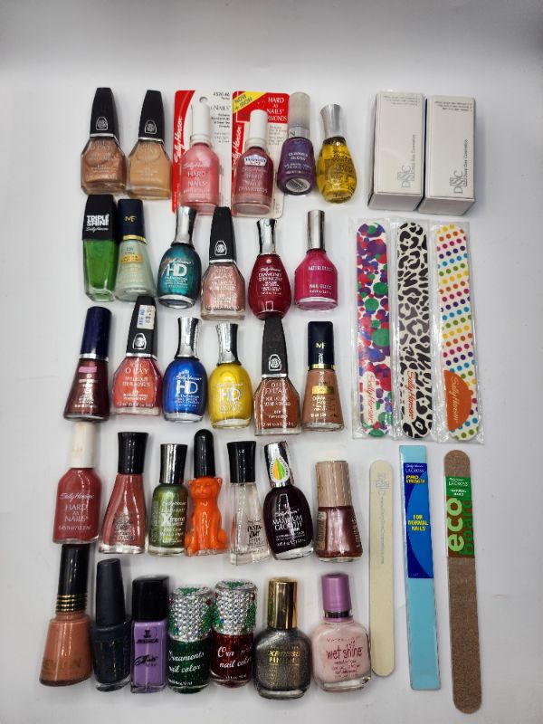 Photo 1 of Miscellaneous Brand Name Nail Polish & Files New