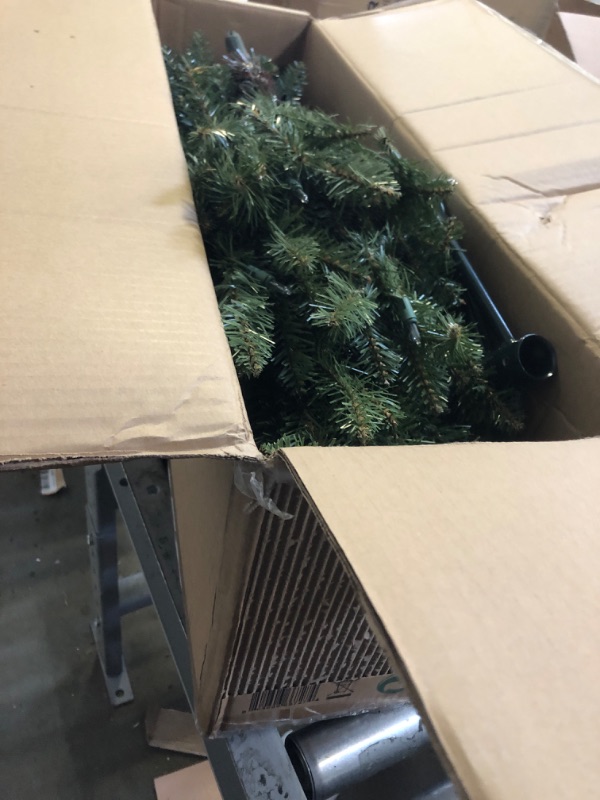 Photo 2 of Puleo International 4.5 Foot Pre-Lit Slim Fraser Fir Artificial Christmas Tree with 150 UL-Listed Clear Lights, Green 4.5' Slim Fraser Fir with 150 Clear Lights Christmas Tree