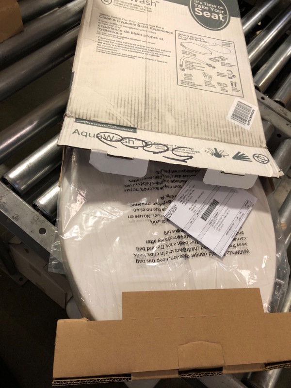 Photo 1 of American Standard 5900A05G.020 Aqua Wash Non-Electric Bidet Seat for Elongated Toilets, 14.9 in Wide x 3.6 in Tall x 21.1 in Deep, White Standard Packaging