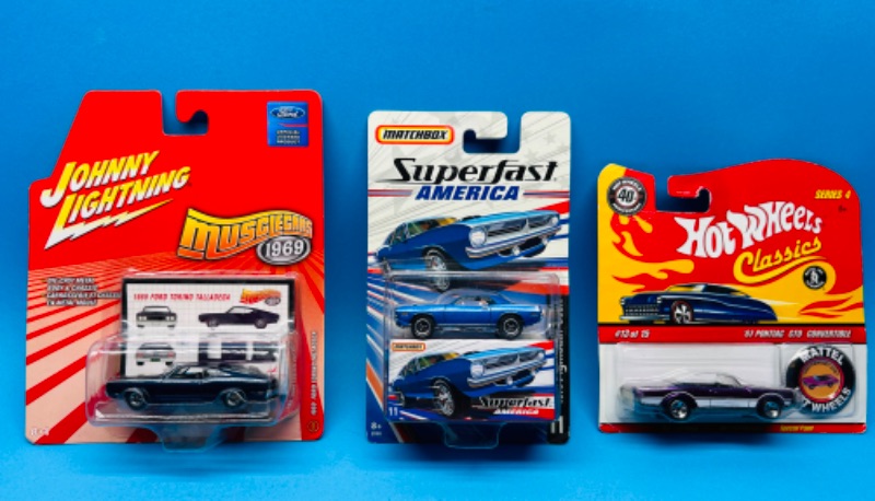 Photo 1 of 698449…3 die cast cars 