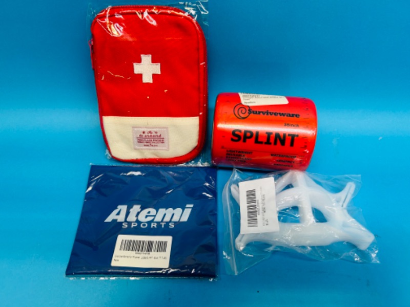 Photo 1 of 698472…36” splint, 1st aid pouch, face mask inserts, and exercise bands