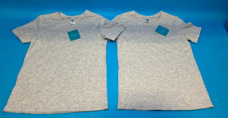 Photo 1 of 698478…2 kids size medium T-shirts 