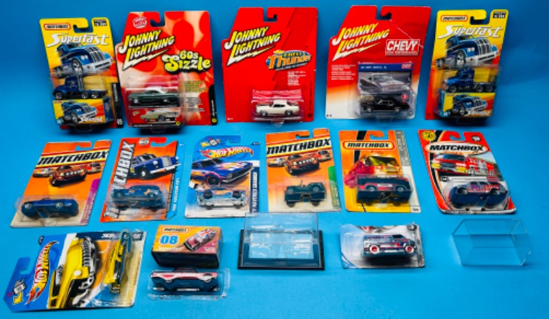 Photo 1 of 698498…damaged packages- die cast cars