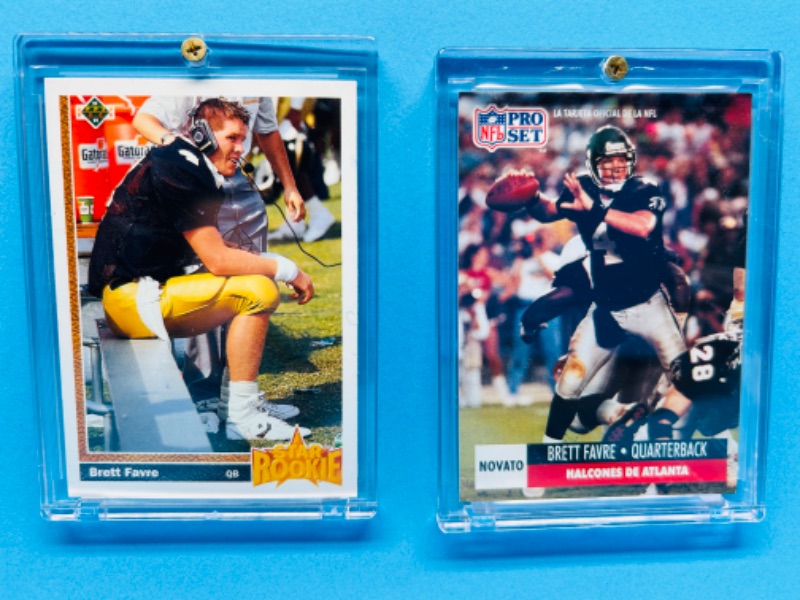 Photo 1 of 698580…2 Brett Favre rookie cards in hard plastic cases 
