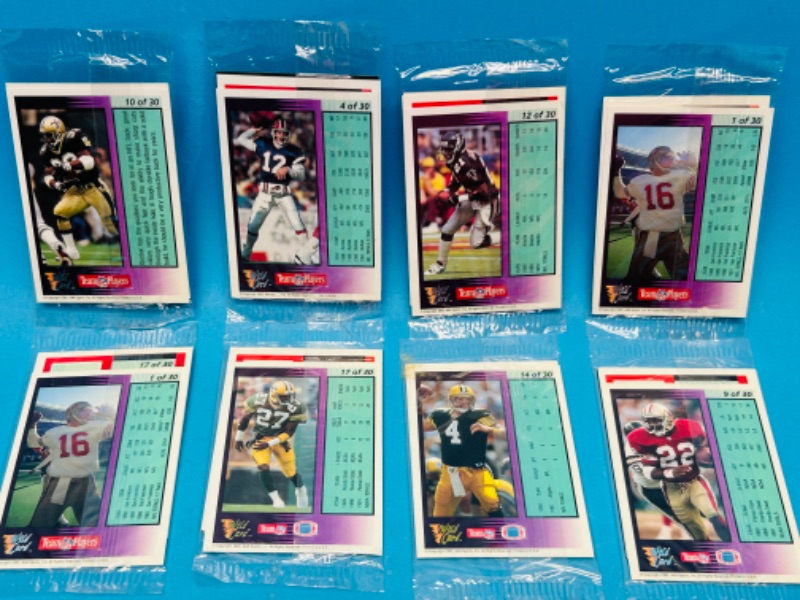 Photo 2 of 698645…8 sealed NFL wild card packs of cards- 4 different stat smashers cards in each