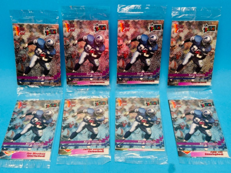 Photo 1 of 698645…8 sealed NFL wild card packs of cards- 4 different stat smashers cards in each