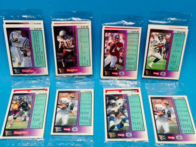 Photo 2 of 698646… 8 sealed NFL wild card packs of cards- 4 different stat smashers cards in each