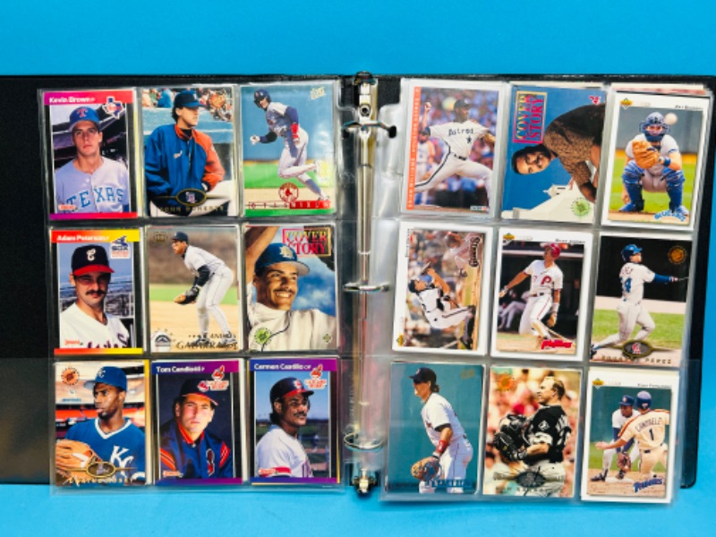 Photo 1 of 698656…180 mixed baseball trading cards in binder 