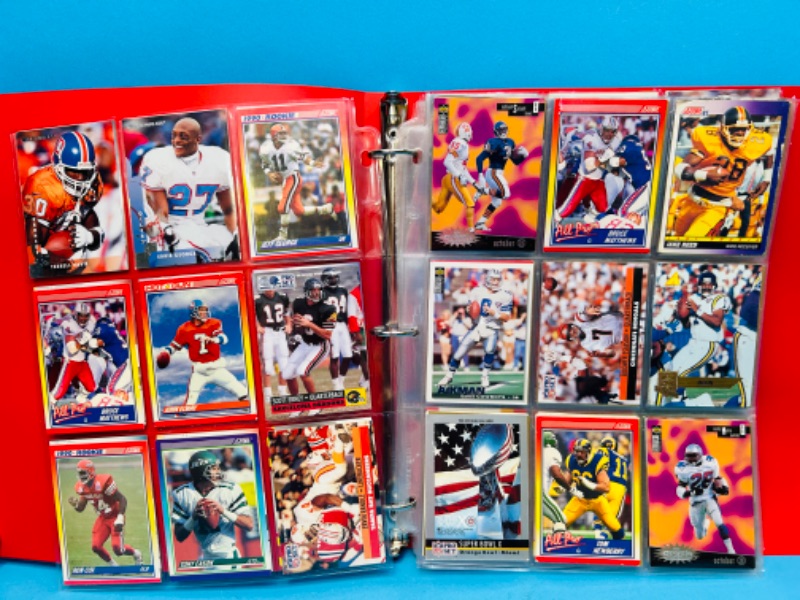 Photo 1 of 698657…216 mixed football trading cards in binder 