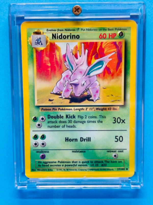 Photo 1 of 698667…Pokémon nidorino card 37/102  in hard plastic case