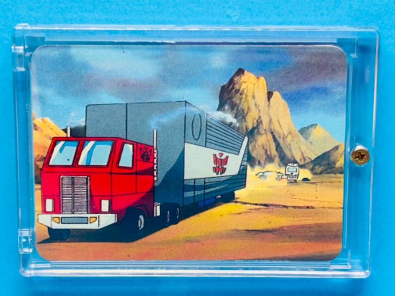 Photo 1 of 698671…1985 transformers Optimus Prime card 74 series 1  in hard plastic case