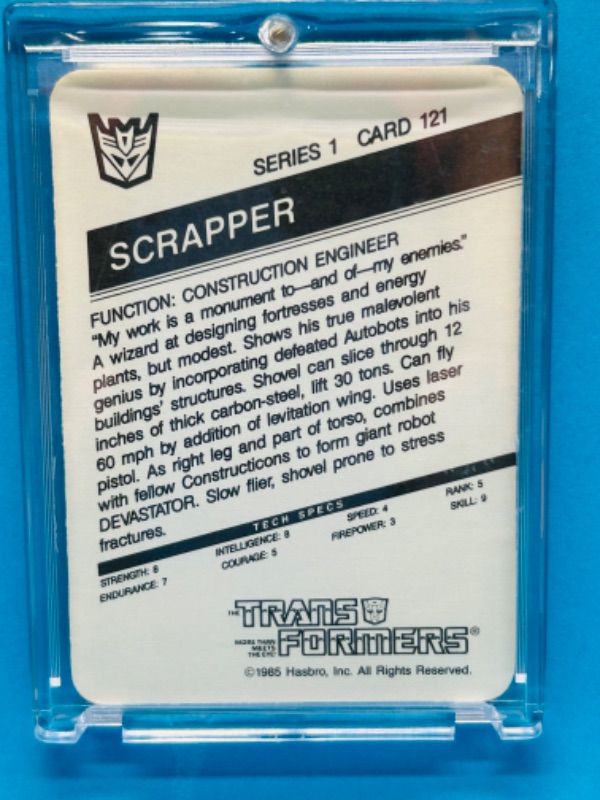 Photo 2 of 698674…1985 Transformers Scrapper card 121 series 1  in hard plastic case