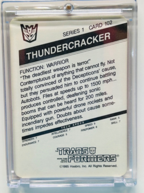 Photo 2 of 698677…1985 Transformers Thundercracker card 102 series 1  in hard plastic case