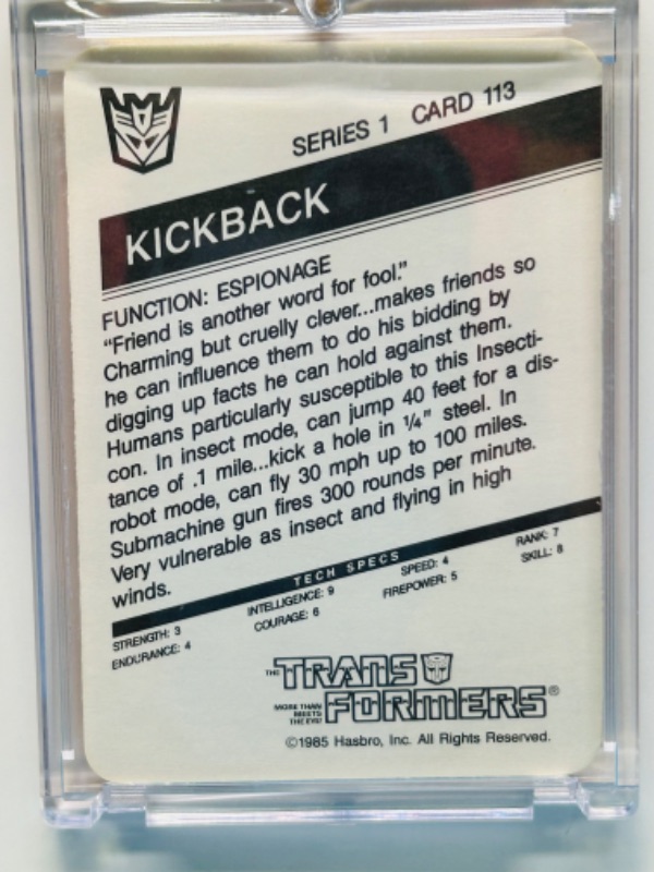 Photo 2 of 698678…1985 Transformers Kickback card 113 series 1  in hard plastic case