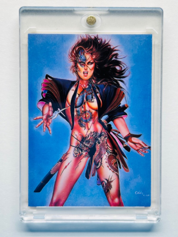 Photo 1 of 698695…1992 Olivia promotional card  in hard plastic case 