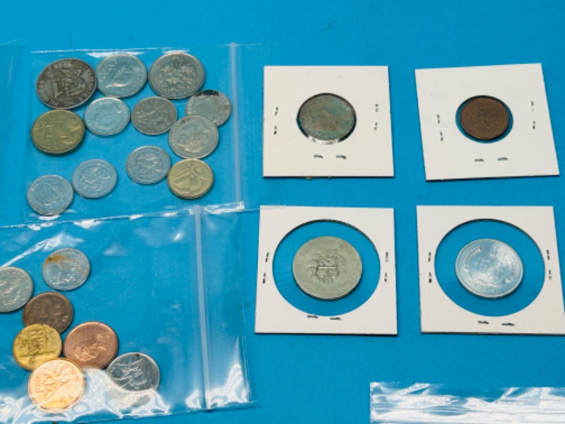 Photo 3 of 698712…circulated foreign and U.S. coins and 2 stamps 22k gold