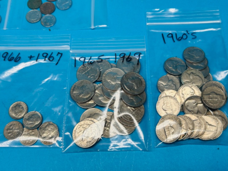 Photo 1 of 698712…circulated foreign and U.S. coins and 2 stamps 22k gold