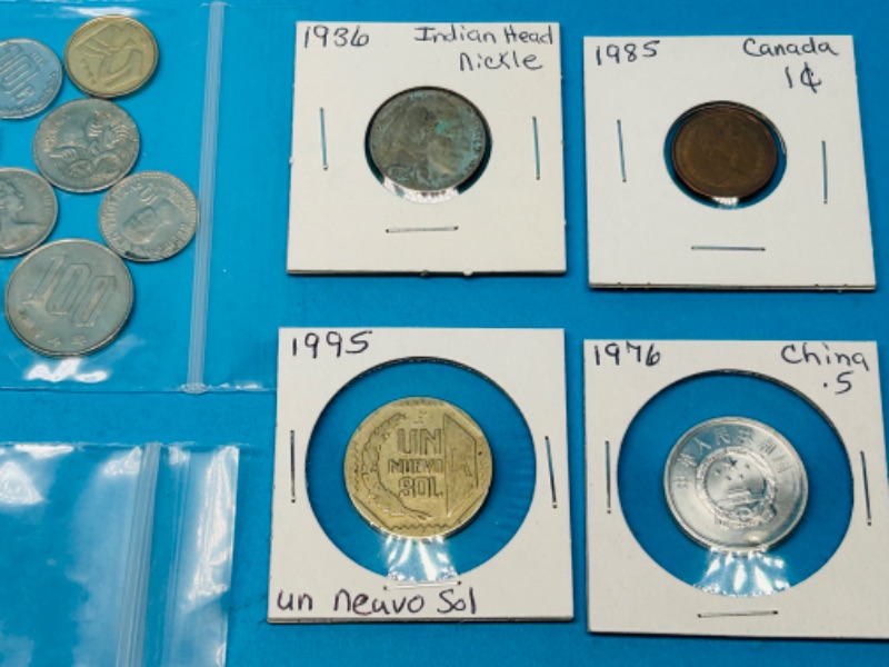 Photo 4 of 698712…circulated foreign and U.S. coins and 2 stamps 22k gold