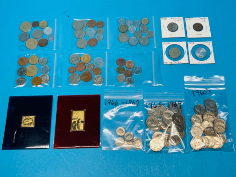 Photo 1 of 698712…circulated foreign and U.S. coins and 2 stamps 22k gold