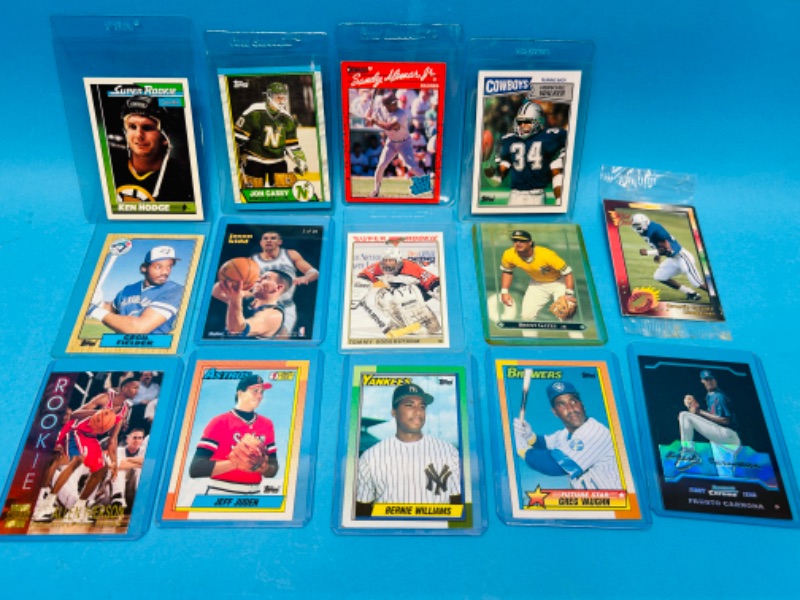 Photo 1 of 698722…Rookie sports cards in hard plastic sleeves 