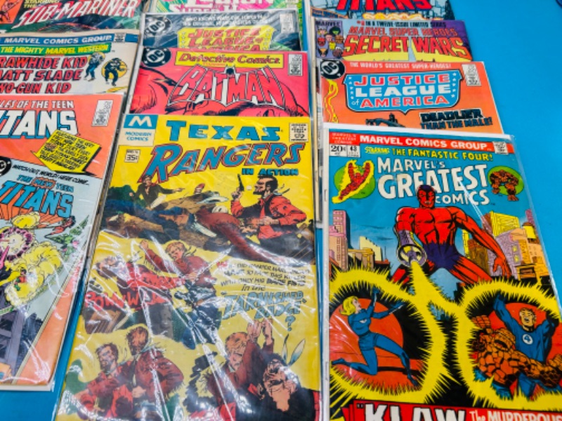 Photo 2 of 698736…major damaged older comics in sleeves- stains, rips, folds, etc