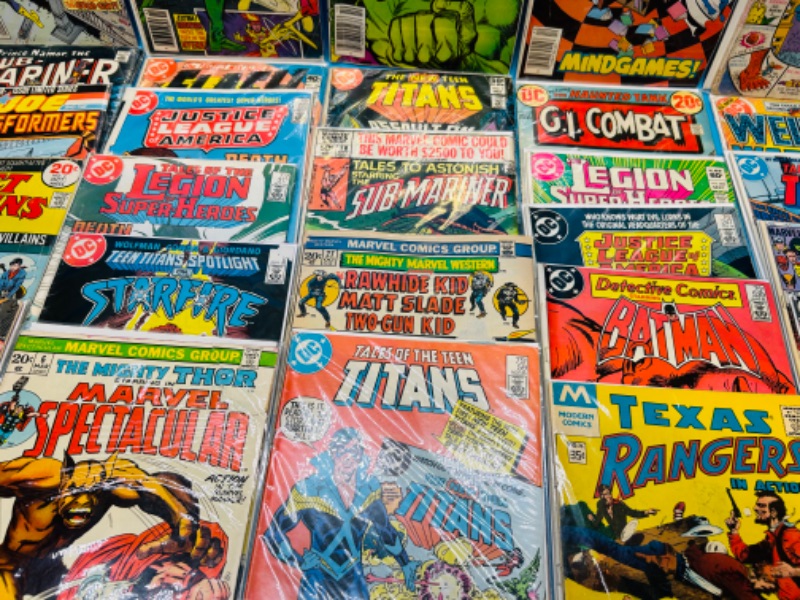 Photo 3 of 698736…major damaged older comics in sleeves- stains, rips, folds, etc