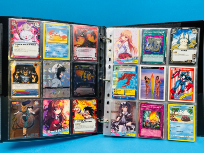 Photo 1 of 698746…234 mixed character and comic cards in binder