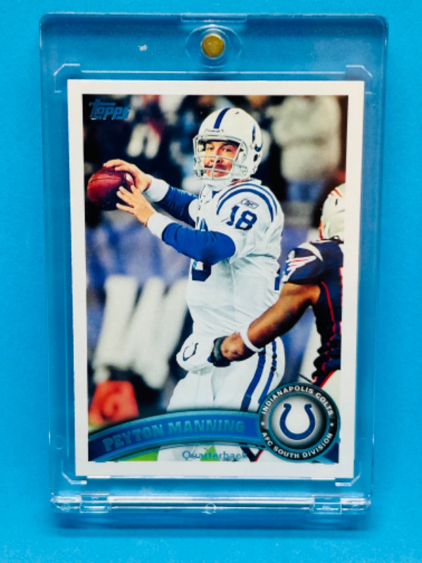 Photo 1 of 698763…topps Peyton manning card 300 in hard plastic case