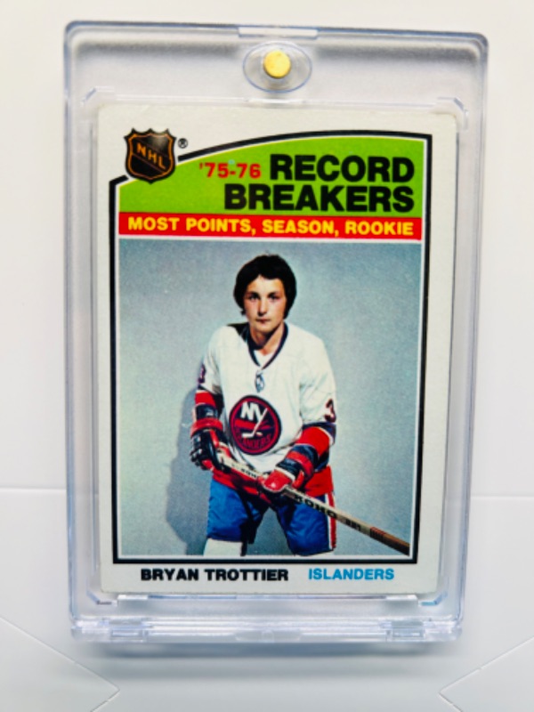 Photo 1 of 698764…vintage Bryan Trottier rookie record breakers card 67  in hard plastic case