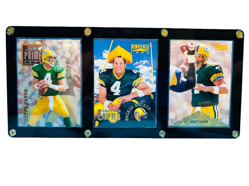 Photo 1 of 698785…3 Brett Favre trading cards in display case