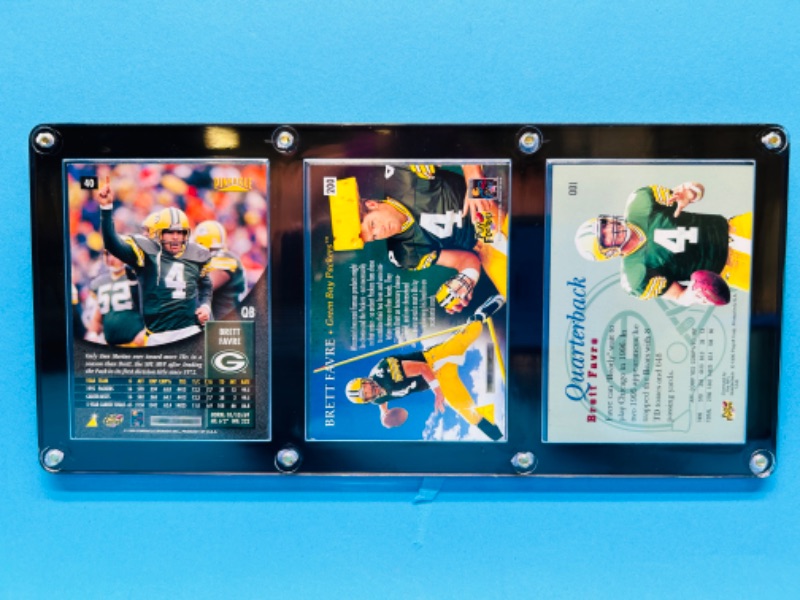 Photo 2 of 698785…3 Brett Favre trading cards in display case