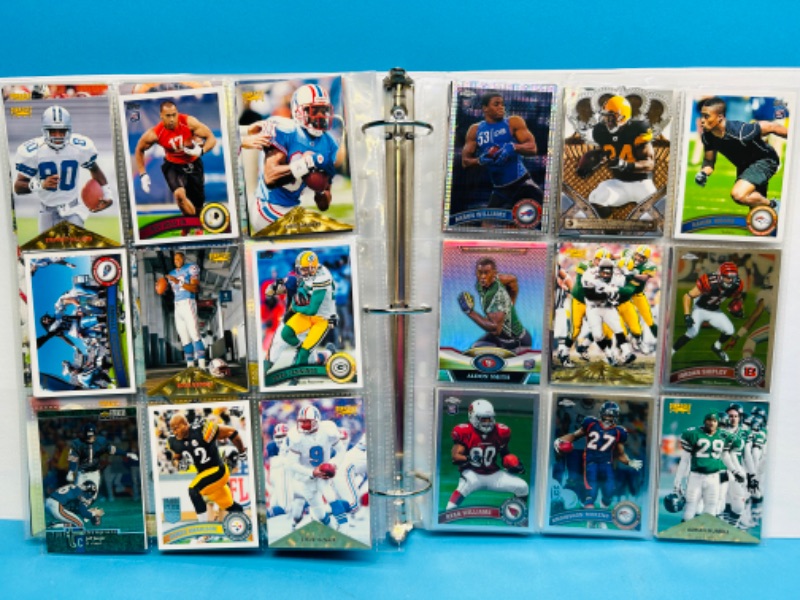 Photo 11 of 698786…306 mixed football trading cards in binder- several refractor cards