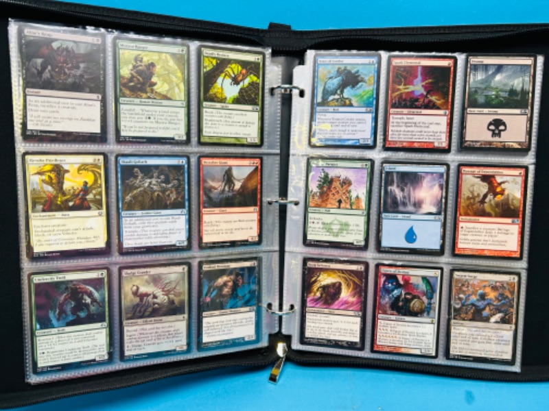 Photo 1 of 698788…324 mixed Magic the gathering cards in binder 