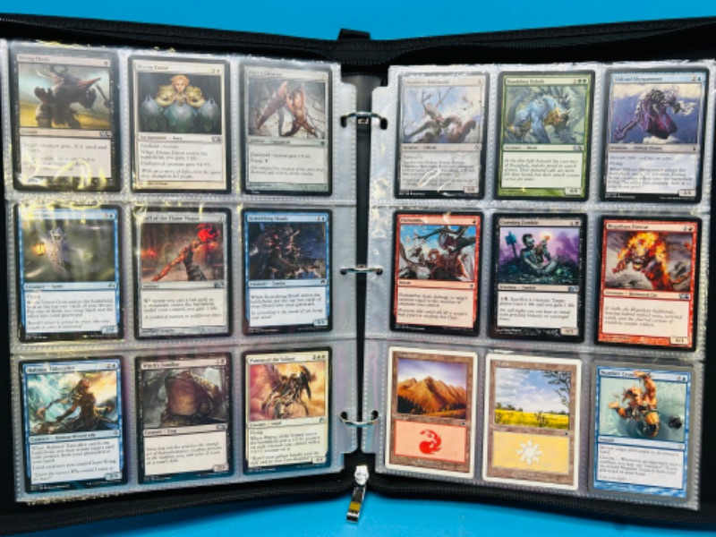 Photo 1 of 698788…324 mixed Magic the gathering cards in binder 